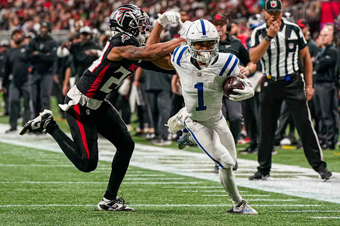 Dec 24, 2023; Atlanta, Georgia, USA; Indianapolis Colts wide receiver Josh Downs (1) runs against Atlanta Falcons cornerback A.J. Terrell (24) after a catch during the second half at Mercedes-Benz Stadium.